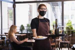 waitress-works-restaurant-medical-mask-gloves-during-coronavirus-pandemic
